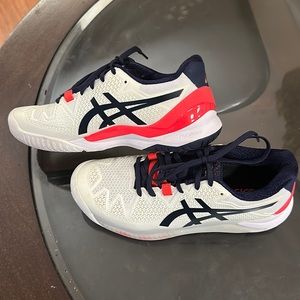 This tennis shoes have a long toe bed. Worn around the house only.